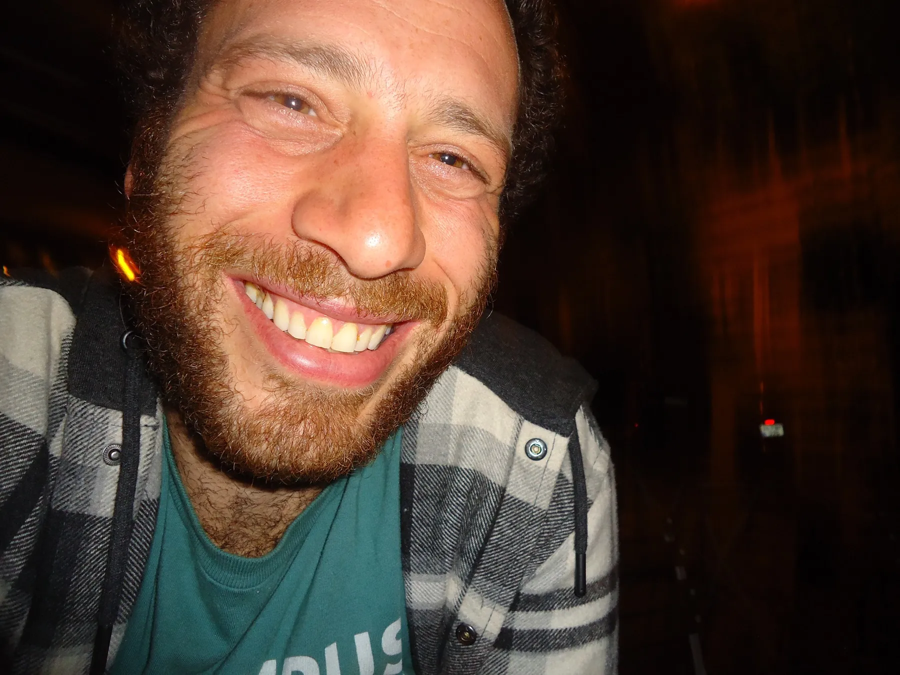Bearded man laughing, close-up