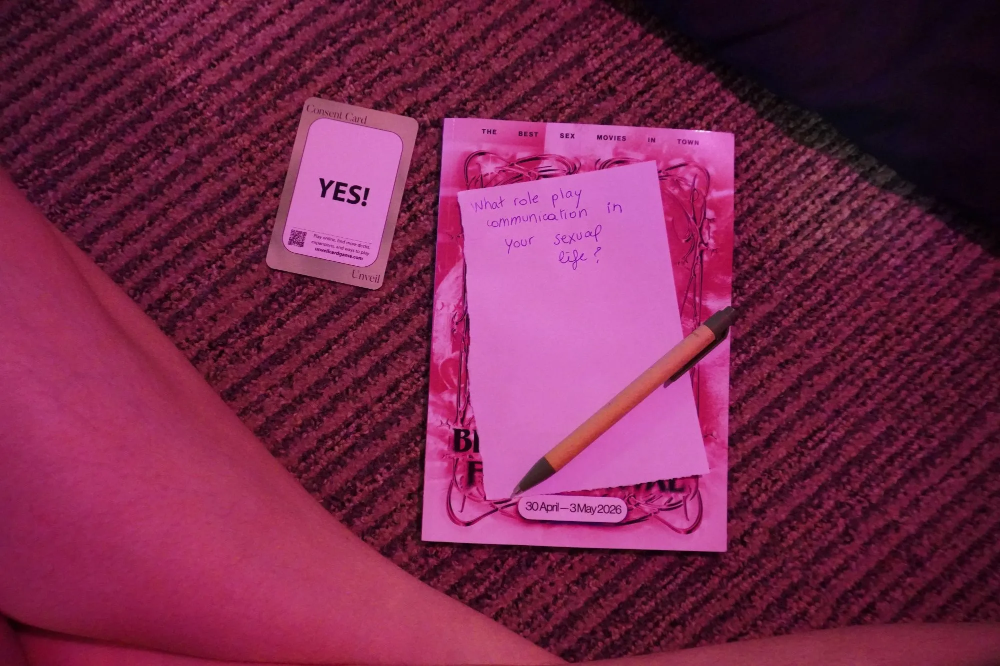 A YES consent card next to a handwritten question about communication and sexual life